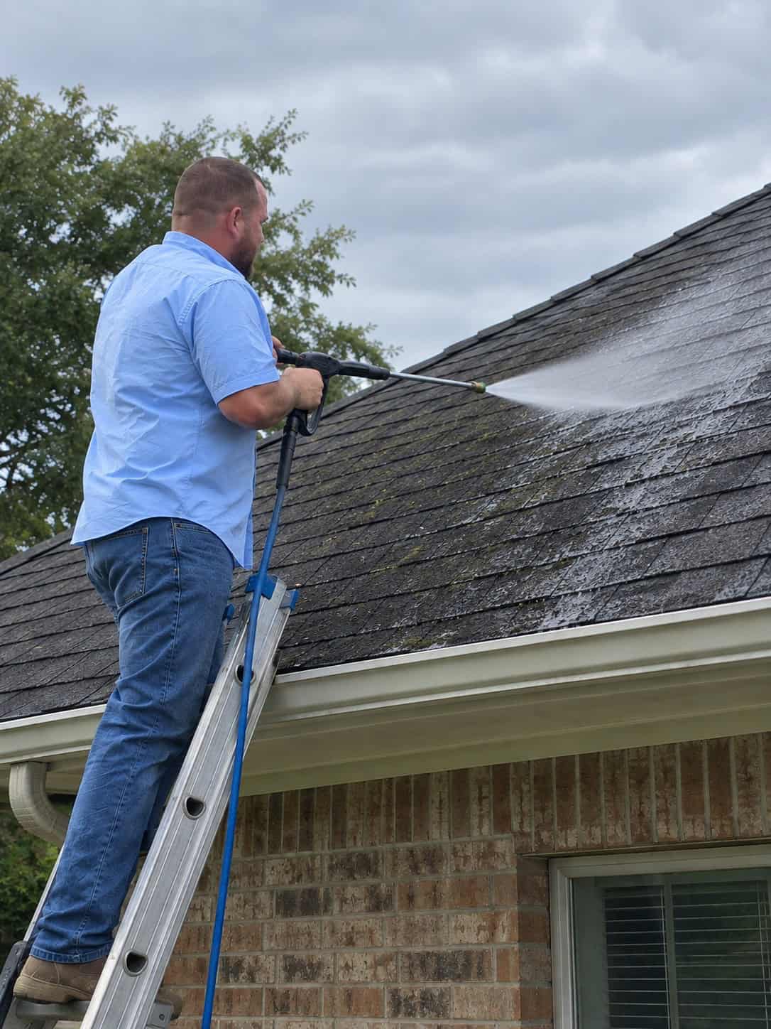 ChatGPT Image Sep 19, 2026, 02_24_03 PM High-pressure roof cleaning by professional exterior house washing experts.